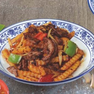 Fried potatoes with meat