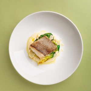 Crispy white fish fillet with white wine sauce