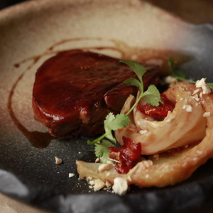 Tongue steak with stewed cabbage