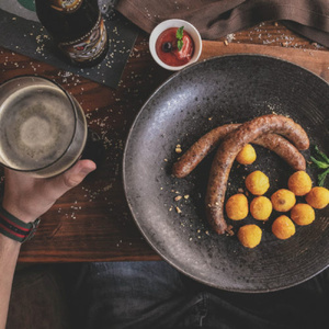 Chicken sausages with potato balls