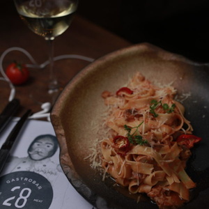 Fettuccine with trout in tomato sauce