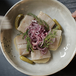 Herring with baked potatoes and onions