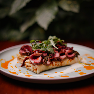 Pancakes with roast beef, curd cheese and sun-dried tomatoes