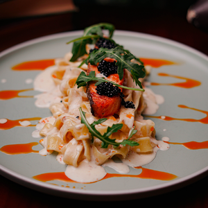 Pappardelle and salmon steak in creamy sauce