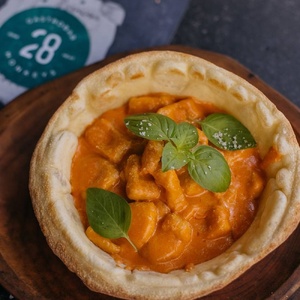 Gnocchi in a bread bowl with tomato sauce